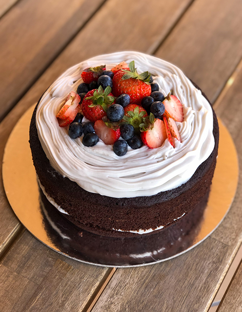 Chocolate Cake With Vanilla Icing & Fresh Berries